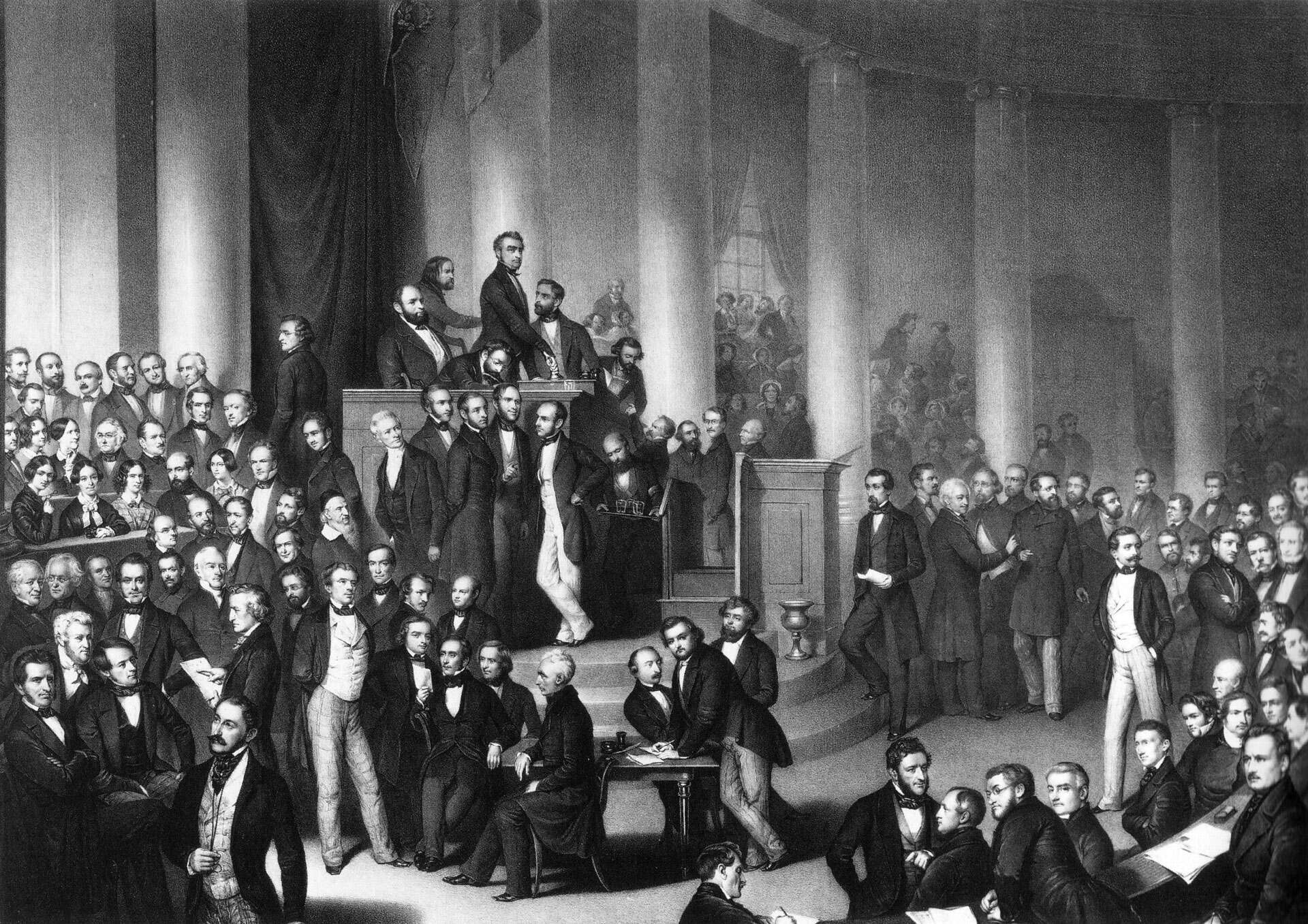 Darstellung der Nationalversammlung in der Frankfurter Paulskirche von Eduard Mayer. Stehend in der Mitte wurde Präsident Heinrich Freiherr von Gagern mit dem Griff an der Glocke gezeichnet. Foto: gemeinfrei